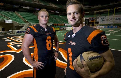Al Hartmann   |  The Salt Lake Tribune 
Brothers Jason, left, and Aaron Boone play for the Utah Blaze.   They grew up together in Fillmore where they both played high school football.
