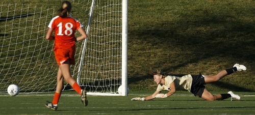 Trent Nelson  |  The Salt Lake Tribune
Davis goalkeeper Danielle MacKay watches the ball go into the net as Brighton's Stephanie Verdoia (not pic'd) scores. Brighton defeated Davis high school 3-0 at the 5A girls' soccer state championships semifinals at Juan Diego High School Tuesday, October 19, 2010