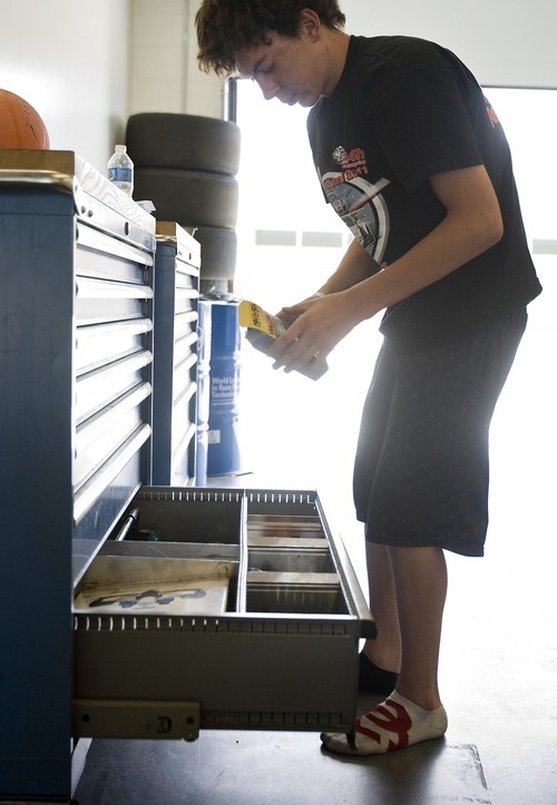 Djamila Grossman  |  The Salt Lake Tribune

Madison Snow, 15, gets his car ready for a race at the Miller Motorsports Park in Tooele on Sunday, July 17, 2011. Madison grew up in a successful racing family and has been winning a lot of races.