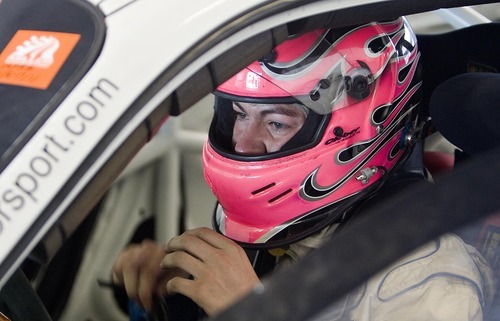 Djamila Grossman  |  The Salt Lake Tribune

Madison Snow, 15,  gets ready for a race at the Miller Motorsports Park in Tooele on Sunday, July 17, 2011. Madison grew up in a successful racing family and has been winning a lot of races.