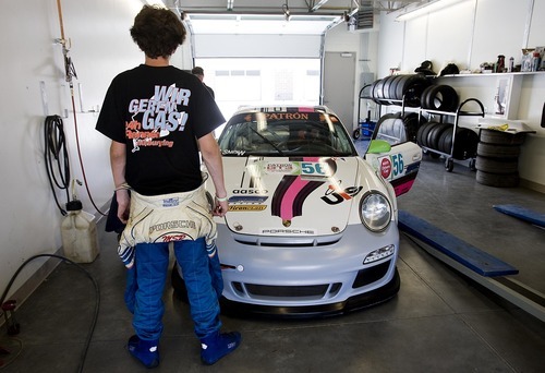 Djamila Grossman  |  The Salt Lake Tribune

Madison Snow, 15, looks at his car as he gets ready for a race at the Miller Motorsports Park in Tooele on Sunday, July 17, 2011. Snow grew up in a successful racing family and has been winning a lot of races.