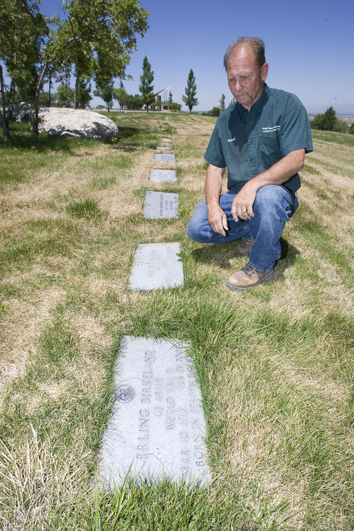 Al Hartmann  |  The Salt Lake Tribune
Arnold Warner, grounds supervisor for the Utah Veterans Cemetery, checks out a row of grave markers that have settled and shifted due to heavy machinery used to maintain the cemetery. The sod is in bad shape too. The cemetery has received $4.45 million in federal money to renovate the cemetery where 3,900 veterans are buried. The grave markers will be removed and replaced exactly where they were after the area is smoothed and new sod is laid later this year.