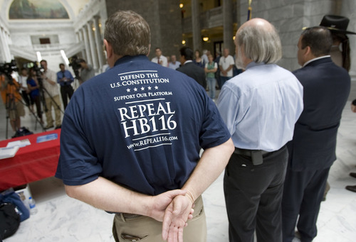 Al Hartmann  |  The Salt Lake Tribune
Proponents of repealing HB116  rally at the Capitol Rotunda on Wednesday.