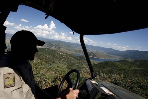Trent Nelson  |  The Salt Lake Tribune
Ranger Drew Patterson patrols Wasatch Mountain State Park in Midway on Saturday, July 2, 2011.