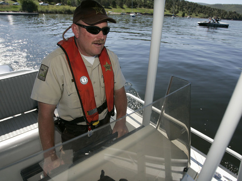 Tribune file photo
Utah State Parks boating director Dave Harris sets off on patrol in 2009 at Rockport Reservoir.