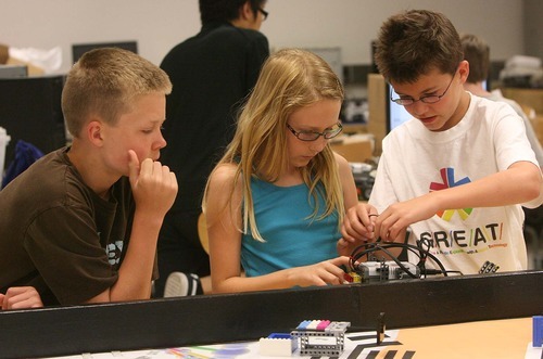 Leah Hogsten  |  The Salt Lake Tribune
Jakob Thygerson, 13, left, Zoe Reid, 11, and Tony Sabia, 12, work on creating robots during the University of Utah's GREAT summer camp on Friday at the Merrill Engineering Building.