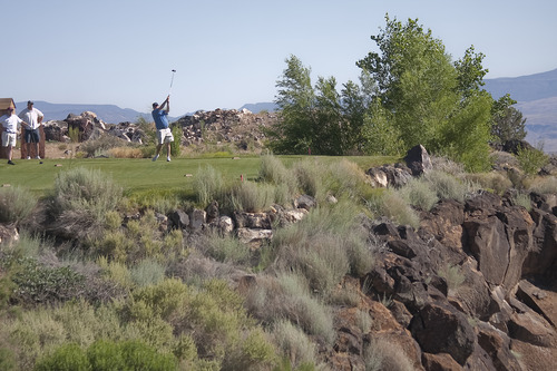 Margaret Distler  |  The Salt Lake Tribune

The Salt Lake Tribune sports writer Jay Drew tees off from hole 16 at the Valderra Golf Course in St. George on Monday, June 27, 2011. Fellow sports writers Gordon Monson and Kurt Kragthorpe joined Drew as they played the 18 toughest golf holes in Utah over the course of three days.
