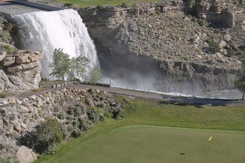 Margaret Distler  |  The Salt Lake Tribune

A waterfall runs alongside hole 7 at Millsite Golf Course in Ferron on Monday, June 27, 2011. This was the first hole that The Salt Lake Tribune sports writers Gordon Monson, Jay Drew and Kurt Kragthorpe played as one of the 18 toughest golf holes in Utah.
