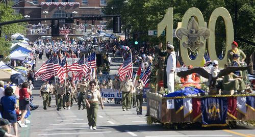 Al Hartmann  | The Salt Lake Tribune   
Boy Scouts of America, celerating the group's 100 year anniversary, march with flags and floats at the 2010 Days of '47 Parade.