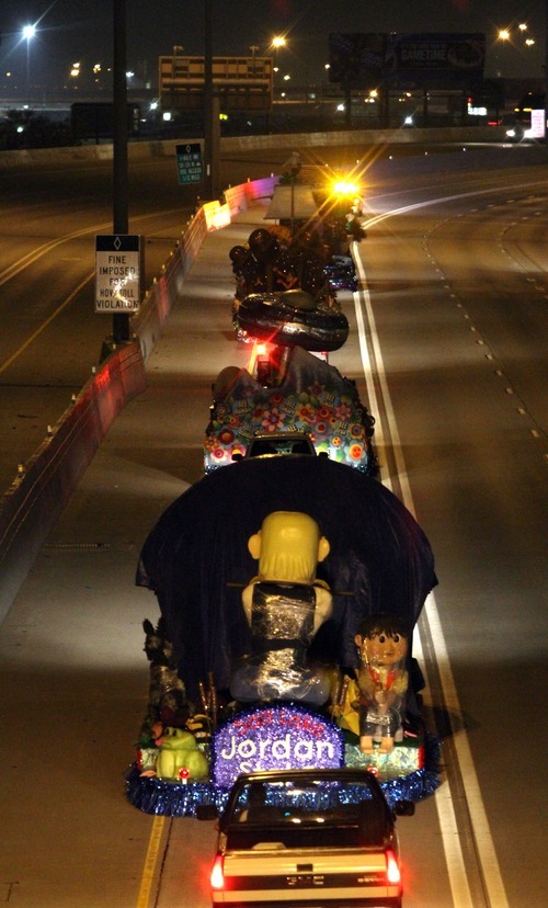 Rick Egan   |  The Salt Lake Tribune
Floats prepared for the Days of '47 Parade make their way along I-15 from Sandy to the staging area in downtown Salt Lake City in the early hours on Monday, July 25, 2011.