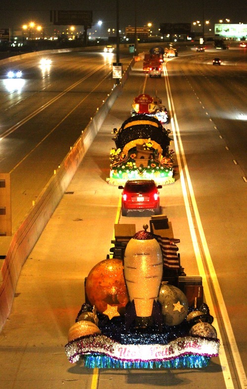 Rick Egan   |  The Salt Lake Tribune

Floats prepared for the Days of '47 Parade make their way along I-15 from Sandy to the staging area in downtown Salt Lake City in the early hours on Monday, July 25, 2011.