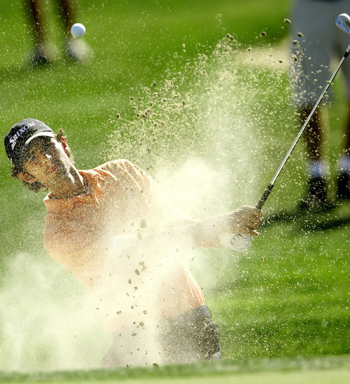 Chris Detrick/Salt Lake Tribune
Saratoga Springs, UT--8/27/06--4:26:47 PM-
Zach Johnson blasts out of a sand trap during the 2006 Utah Open held at Talons Cove Golf Course.  Bountiful pro Pete Stone won the tournament.Zach Johnson placed 2nd.