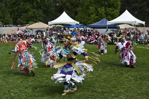 Chris Detrick | The Salt Lake Tribune 
Dancers perform the men's grass dance during the Native American Cultural Celebration at Liberty Park Monday July 25, 2011.