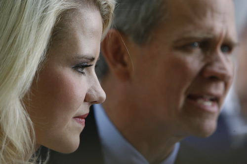 Francisco Kjolseth  |  The Salt Lake Tribune

Elizabeth Smart and her father Ed speak to the media after Brian David Mitchell received a life sentence Wednesday, May 25, 2011.