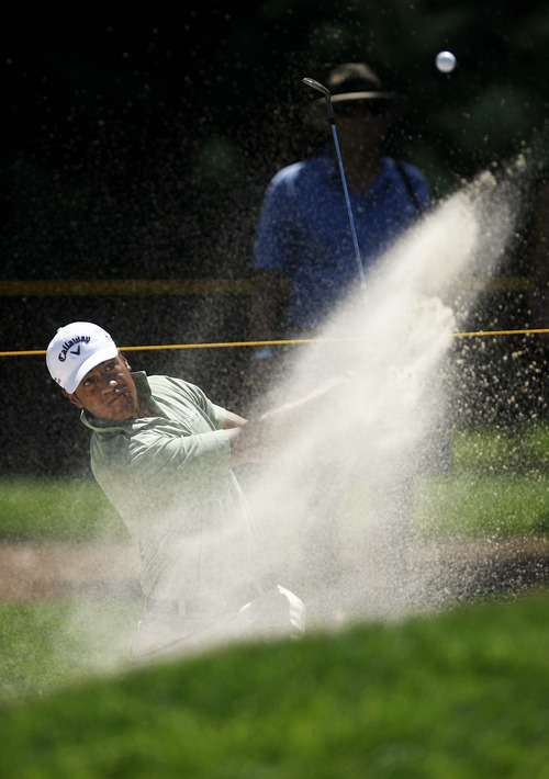 Francisco Kjolseth  |  The Salt Lake Tribune
Tony Finau of Lehi, UT, digs out of the sand in hole 2 in the Nationwide Tour, the Triple-A of the PGA Tour, as it makes its stop at the Willow Creek Country Club in Sandy on Thursday, July 28, 2011, for the first of four days.