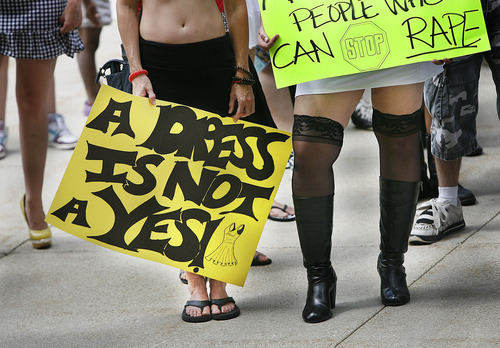 Scott Sommerdorf  |  The Salt Lake Tribune
Several people brought signs for the SlutWalk in Salt Lake City on Saturday.