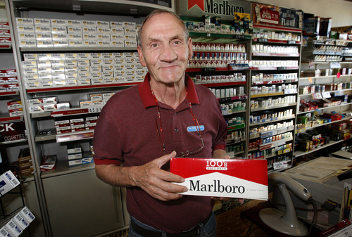 Rick Egan   |  Tribune file photo
Jim Gibbs says tobacco sales are way down in the wake of a state tax increase. He says his business could evenutally close as a result. Utah hiked its tobacco tax last year, raising it from 69.5 cents per pack to $1.70. For the 11 months since then, cigarette sales are down 15 percent with 9.9 million fewer packs sold, according to State Tax Commission figures,