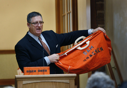 Scott Sommerdorf  |  The Salt Lake Tribune
Sam Bracken shows the orange duffle bag that prompted the name of his foundation. Brackenshared his story of moving from being a homeless teen to a successful businessman with youth who've been in foster care. He has founded 