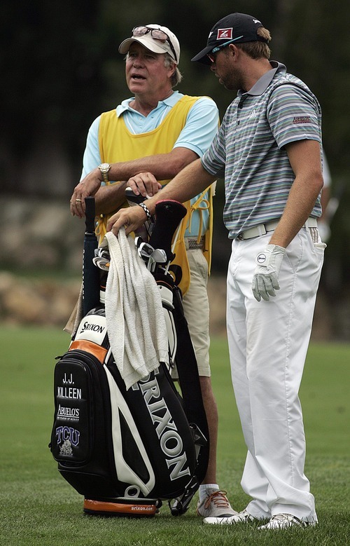 Djamila Grossman  |  The Salt Lake Tribune

J.J. Killeen talks to his dad, Joe, who was his caddy in the Utah Championship of the Nationwide Tour at Willow Creek Country Club in Sandy, Utah, on Sunday, July 31, 2011. Killeen won the Championship.