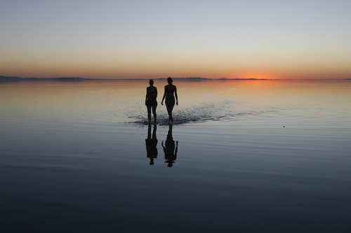 Rick Egan   |  The Salt Lake Tribune
Foreign tourists take photos on the shore of Antelope Island in 2010.