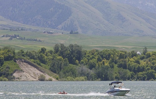 Paul Fraughton  |  The Salt Lake Tribune
Boaters enjoy an afternoon on Hyrum Reservoir on June 28.