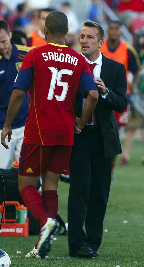 Leah Hogsten  |  The Salt Lake Tribune 
Real's Alvaro Saborio is congratulated as he exits the field in the second half by head coach Jason Kreis. 
Real Salt Lake defeated the Chicago Fire 1-0  at Rio Tinto Stadium Saturday, September 18, 2010, in Sandy.
