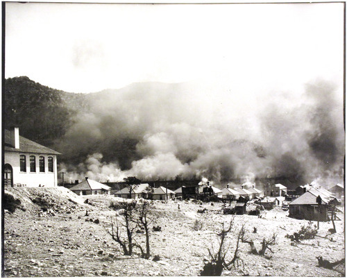 Michael Mangum  |  The Salt Lake Tribune

Billowing smoke obscures the coke ovens at the Sunnyside coal mine in this photo, taken in about 1915. 
Photo courtesy of the Utah Historical Society