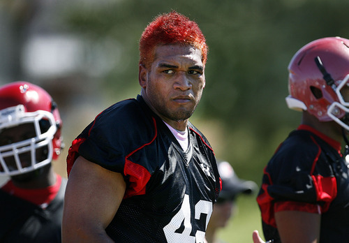 Scott Sommerdorf  |  The Salt Lake Tribune
Utah LB Nai Fotu practiced Thursday, August 4, 2011, with his hair dyed red. In past years the linbacking group has done unique things with their hairstyles.