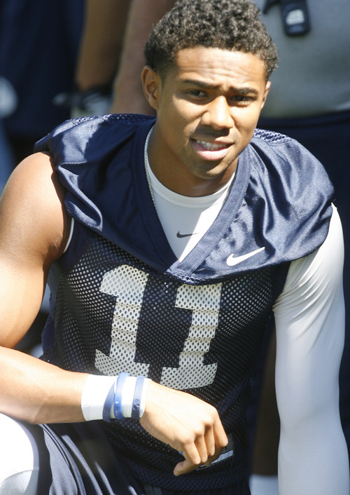 Rick Egan   |  The Salt Lake Tribune

BYU Wide Receiver Ross Apo (11) before   football practice, at BYU, Saturday, August 6, 2011