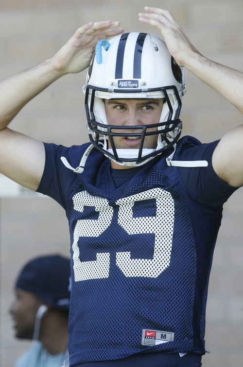 Rick Egan   |  The Salt Lake Tribune

BYU wide receiver Jordan Smith, before football practice, at BYU, Saturday, August 6, 2011