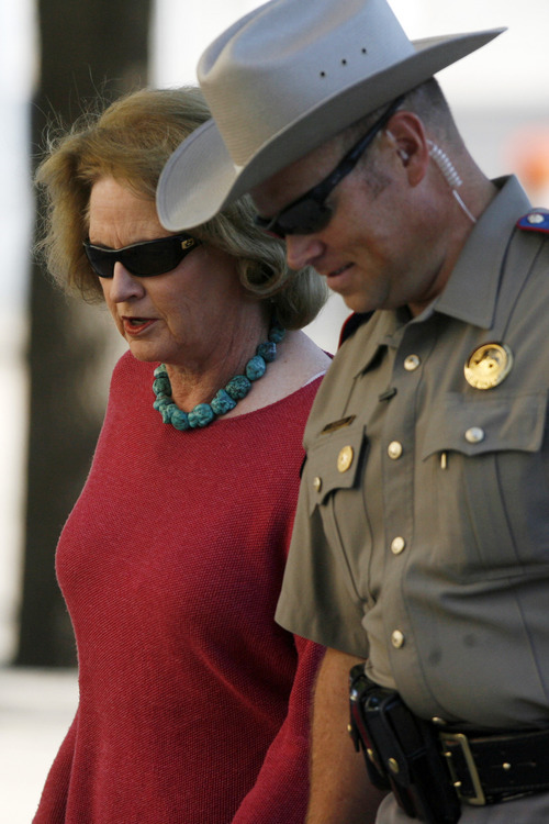 State Judge Barbara Walther arrives at the Tom Green County Courthouse, Saturday, Aug. 6, 2011, in San Angelo, Texas, for the trial of polygamist religious leader Warren Jeffs, now in its penalty phase. Jeffs was found guilty on Thursday of sexual assault of a child and aggravated sexual assault of a child. (AP Photo/San Angelo Standard-Times, Patrick Dove)