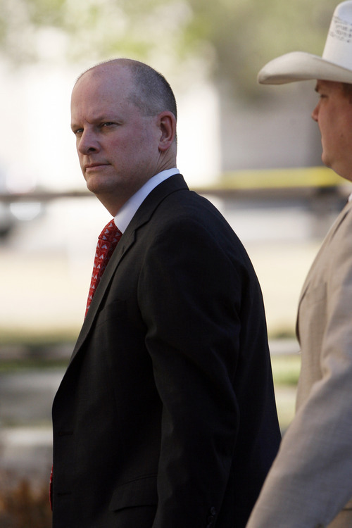 Special prosecutor Eric Nichols arrives at the Tom Green County Courthouse in San Angelo, Texas, for a weekend session in court, Saturday, Aug. 6, 2011, for the trial of Warren Jeffs. Jeffs was convicted Thursday of sexual assault of a child and aggravated sexual assault of a child. (AP Photo/San Angelo Standard-Times, Patrick Dove)