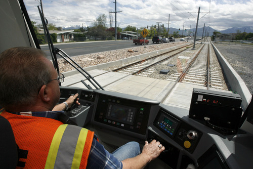 Francisco Kjolseth  |  Tribune file photo
Train operator Mike Shepherd tests a train on the new West Valley City during the past two months of extensive training and preparation leading up to Sunday's opening.