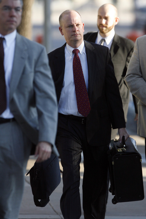 State special prosecutor Eric Nichols arrives at the Tom Green County Courthouse in San Angelo, Texas, on Monday, Aug. 8, 2011. The state may call two more witnesses in the penalty phase in the trial of polygamous leader Warren Jeffs. Jurors convicted Jeffs last week of sexually assaulting two girls, ages 12 and 15, whom he'd taken as brides. He faces up to life in prison. Jeffs has led the Fundamentalist Church of Jesus Christ of Latter-Day Saints since 2002.  (AP Photo/ San Angelo Standard-Times, Patrick Dove)