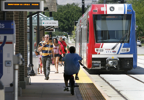 Scott Sommerdorf  |  The Salt Lake Tribune
Passengers disembark from a TRAX train stopped at the West Valley Central Station at 2750 W. 3590 South in West Valley City on Sunday, August 7, 2011.