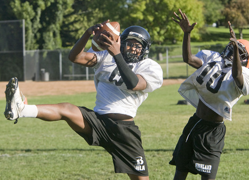 Al Hartmann  |  The Salt Lake Tribune
Highland High School quarterback  Anthony 