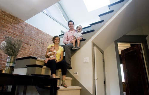 Djamila Grossman  |  The Salt Lake Tribune

Marty and Jessica Patch and their children Penelope, 4 months, and Graham, 3, won the Rocky Mountain Power WattSmart video contest with their energy-efficient home in Salt Lake City, Utah, on Thursday, Aug. 4, 2011. The family poses for a portrait on the steps inside their home.