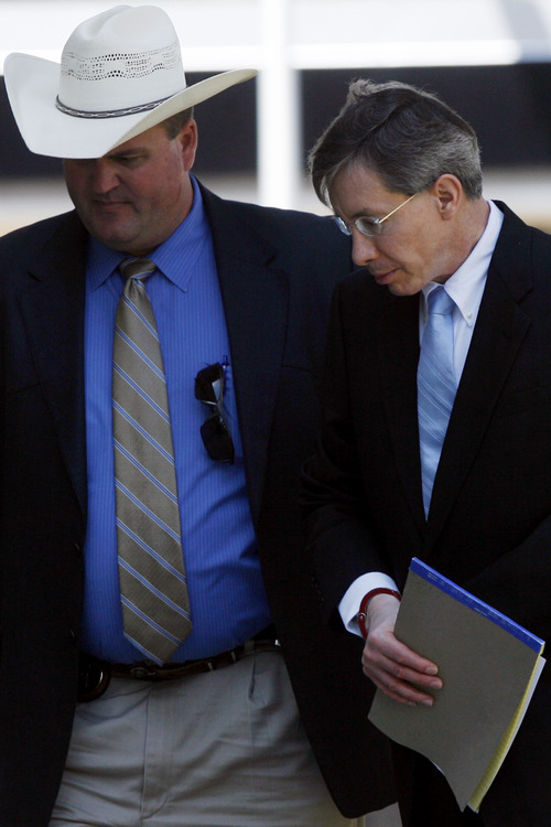 Convicted polygamist religious leader Warren Jeffs is escorted into the Tom Green County Courthouse, Tuesday, Aug. 9, 2011 by Sgt. Wesley Hensley of the Texas Attorney Generalís Office. Jeffs was sentenced to life in prison on Tuesday for sexually assaulting two underage followers he took as brides in what his church deemed 