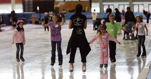 Steve Griffin  |  The Salt Lake Tribune

earn-to-skate programs for all ages are available at the Utah Olympic Oval in Kearns. Here, youngsters try out the ice on the long track on Thursday, July 28, 2011.