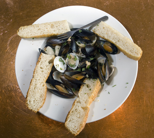 Al Hartmann  |  The Salt Lake Tribune
Fratelli Ristorante's appetizer: Clams and mussels steamed in a garlic-lemon broth and served with focaccia.