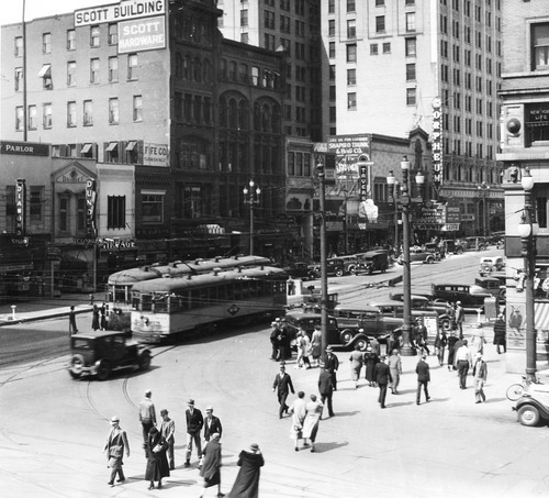Salt Lake Tribune file photo

People and trolley cars make their way along Main Street in July, 1943.