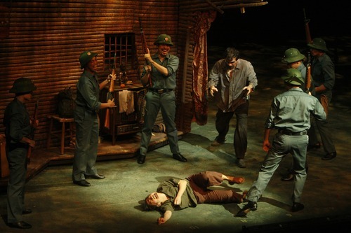 Shannon Tyo, who plays the role of Kim, is beaten during a performance of 