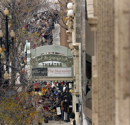 Hundreds wait in line outside the Capitol Theatre in Salt Lake City to buy tickets for the show 