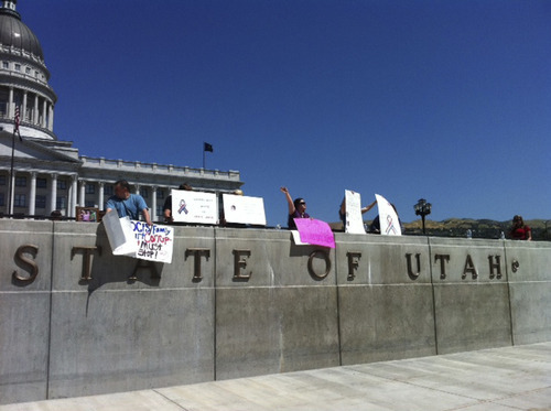 Brooke Adams  |  The Salt Lake Tribune
About two dozen people gathered at the Capitol Friday to protest what they claim is unfair treatment of parents by the Utah Division of Child and Family Services.