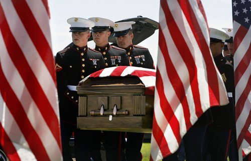 Scott Sommerdorf  |  The Salt Lake Tribune
The Marine honor guard brings the casket containing the body of Sgt. Daniel Gurr to his gravesite in Vernal on Saturday. Gurr, 21, was killed by small arms fire while on patrol in the village of Malozai, Afghanistan.