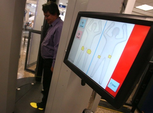 Leah Hogsten  |  The Salt Lake Tribune
TSA employees at Terminal One of Salt Lake City International Airport demonstrated the body scan technology, or Automated Target Recognition, on Wednesday, August 17, 2011, in Salt Lake City. The scan takes about seven seconds and only reveals a computer-generated body shape.