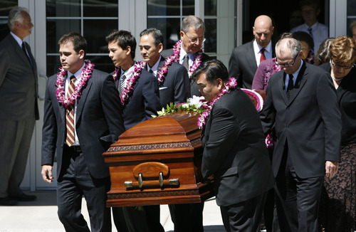 Francisco Kjolseth  |  The Salt Lake Tribune
Pallbarers carry the casket of Chieko Nishimura Okazaki, the first non-Caucasian member of any LDS general board or presidency, following services at the LDS Holladay South Stake Center on Wednesday.