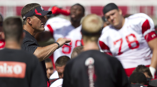 Lennie Mahler  |  The Salt Lake Tribune
Utah head coach Kyle Whittingham speaks to the team at the close of football practice Monday, Aug. 13, 2011, at Rice-Eccles Stadium.