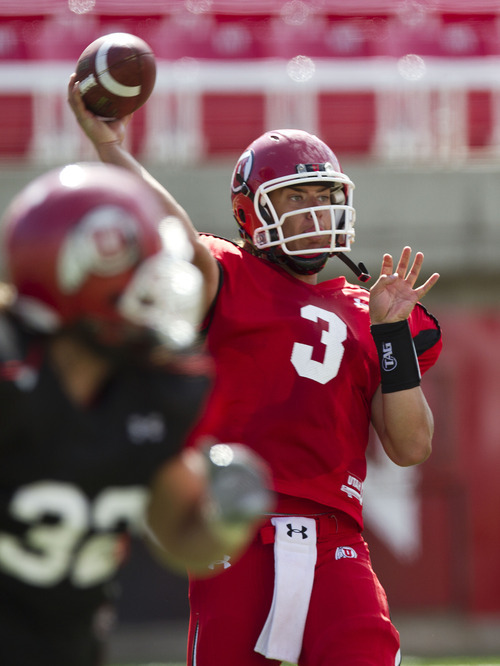 Lennie Mahler  |  The Salt Lake Tribune
Utah quarterback Jordan Wynn throws a pass during practice Monday, Aug. 15, 2011, at Rice-Eccles Stadium.