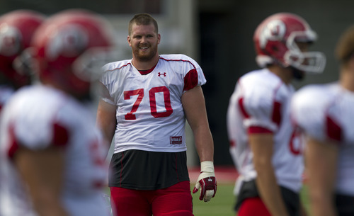 Lennie Mahler  |  The Salt Lake Tribune
Utah offensive lineman Tony Bergstrom watches football practice from the sideline Monday, Aug. 15, 2011, at Rice-Eccles Stadium.